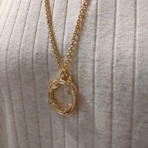 Coach Gold pave necklace.